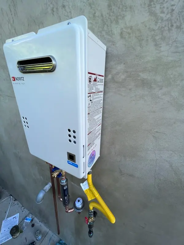 Tankless water heater installation for Larchmont Village Apartments West homes